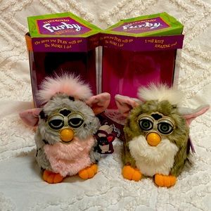 1998 Furby, includes 2,  only one works, original boxes, instructions and tags